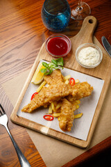 seafood dishes on a wooden table
