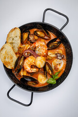 seafood dishes on a wooden table

