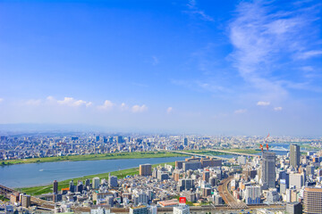 Obraz premium View of Osaka city from Umeda sky building/Kuchu teien observatory, Japan