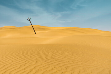 A minimal landscape image of a desert. A electric pole in a desert minimal shot. Minimal landscape...
