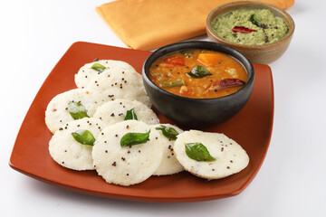 Rava Idly sambar or Idli with Sambhar and green, Popular South Indian breakfast
