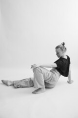 The girl does stretching and exercises
