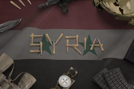 Syria war composition with bullets on flag and military equipment