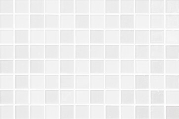 Fototapeta premium White ceramic wall and floor tile abstract background. Design geometric gray mosaic texture decoration of the bedroom. Simple seamless pattern grid for backdrop hospital wall, canteen and kitchen.