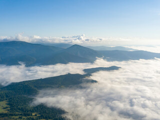 Morning fog in the Ukrainian Carpathians. Aerial drone view.