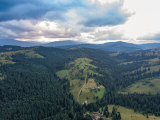 Obraz premium Green Ukrainian Carpathians mountains in summer. Aerial drone view.