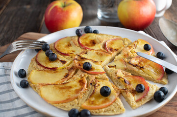 Oat pancake with apples for healthy breakfast