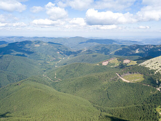 High mountains of the Ukrainian Carpathians in sunny weather. Aerial drone view.