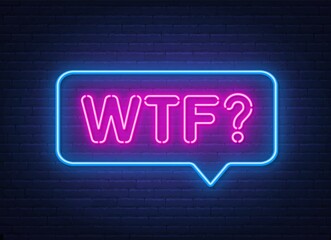 Wtf neon sign in the speech bubble on brick wall background.