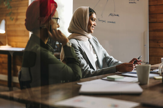 Muslim businesswomen having an online meeting in an office