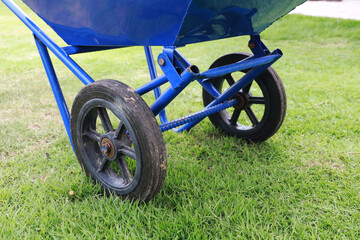 metal wheelbarrow cart on construction site