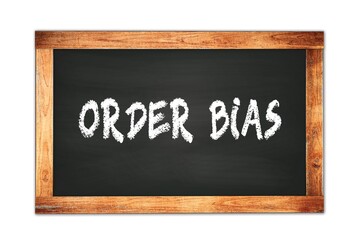 Obraz premium ORDER BIAS text written on wooden frame school blackboard.