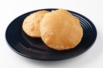 Indian food Puri - Puri is a deep fried bread made from whole wheat flour.