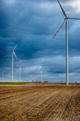 Electric wind turbine generating with blue sky and turbo generator