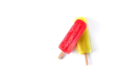Strawberry and lemon popsicles isolated on white background	
