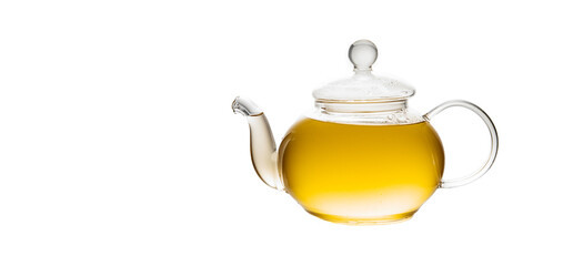 herbal tea served in a transparent glass teapot isolated over white backgound ready for breakfast or tea ceremony