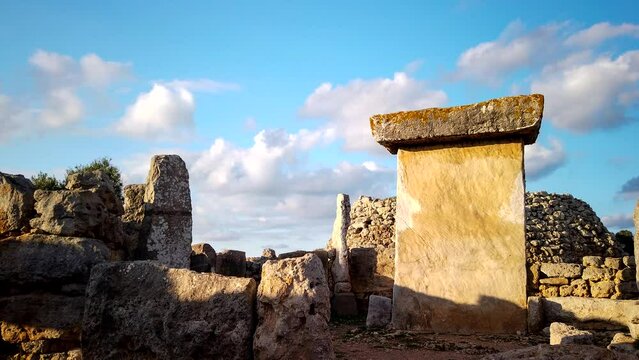 Timelapse of a megalithic structure in the Talayotic town of Trepuc&oacute; on the island of Menorca, Spain. Clouds moving across the sky on a sunny day.	
