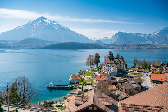 Lake Thun, Niesen and Parkhotel Gunten on a spring day seen from Gunten