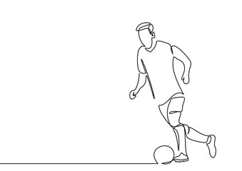 a professional football player drags the ball in a controlled manner