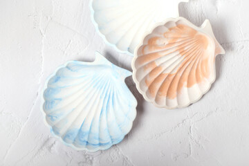 a shell-shaped stand made of gypsum. handmade, seashell. the product is made of gypsum.