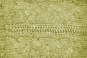 Warm knitting texture in yellow tone.