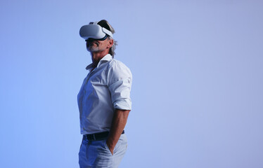 Senior businessman wearing a virtual reality headset