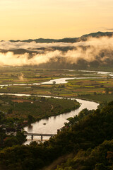 Aerial view of the Kok River during sunrise. - 497050751