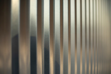 Texture fence. Steel fence of silver color. Horizontal lines.