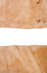 Two pieces of brown leather with a space for text