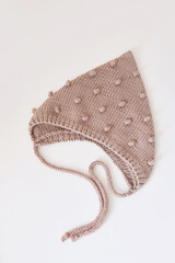 Knitted kids clothes and accessories for knitting. Needlework and knitting. Hobbies and creativity. Knit for children. Handmade. Hobbies and creativity