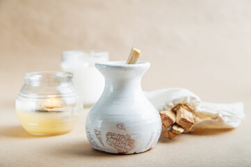 Palo Santo bars close-up and copy space. Ritual cleansing with sacred ibiocai, meditation, aromatherapy with incense and candles..