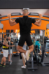 man exercising in gym