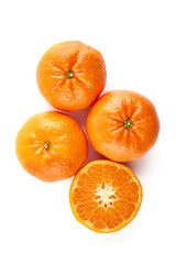 Tangerine or clementine, close-up, isolated on a white background.