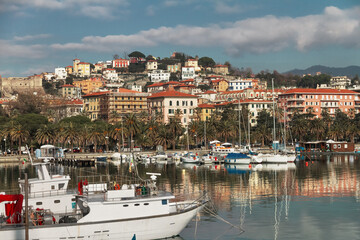 Bay with yachts and embankment of city of La Spezia in Italy