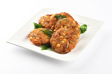 Tea time snack, Dal Vada or Parippu Vada or Paruppu Vadai , deep fried snacks savory food from Kerala fried in coconut oil.