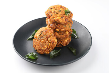 Tea time snack, Dal Vada or Parippu Vada or Paruppu Vadai , deep fried snacks savory food from Kerala fried in coconut oil.