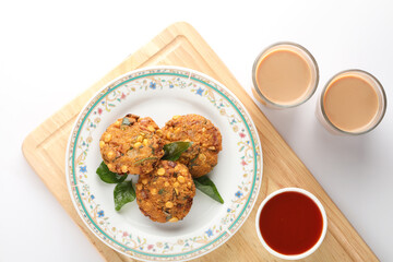 Tea time snack, Dal Vada or Parippu Vada or Paruppu Vadai , deep fried snacks savory food from Kerala fried in coconut oil.
