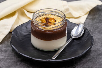 Banana magnolia dessert on dark background. World cuisine delicacies. close up