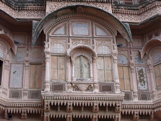 Jodhpur, Rajasthan, India, August 14, 2011: One of the impressive red balconies of the Mehrangarh Fort in the blue city of Jodhpur, India