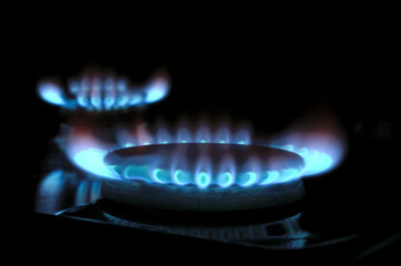 gas burner with burning gas. dark background