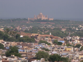 Jodhpur, Rajasthan, India, August 14, 2011: Umaid Bhavan Palace seen from the blue city of Jodhpur