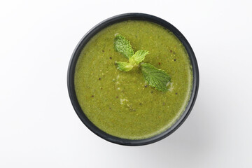 Green Mint Chutney or Pudina Chutney made with Coriander, Pudina & Spices. selective focus