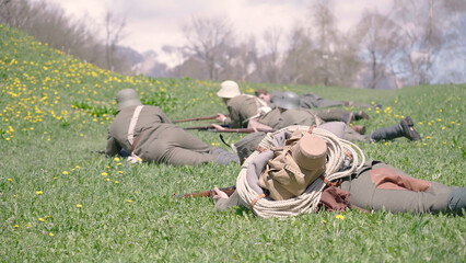 Austro-Hungarian army lying on the grass ground attacking