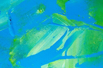 Acrylic blue background with natural canvas texture. Abstract watercolor blue pattern with green splashes. Oil painting with paint brush strokes close up for banner design, trendy greeting card.
