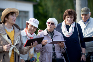 Group of senior using technology