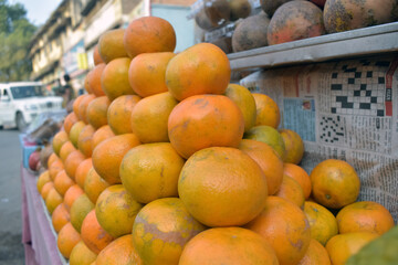 Fresh fruit, orange, in the market. Citrus fruit