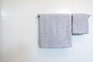  Closeup towel hanging on clothesline in the bathroom with space for texts