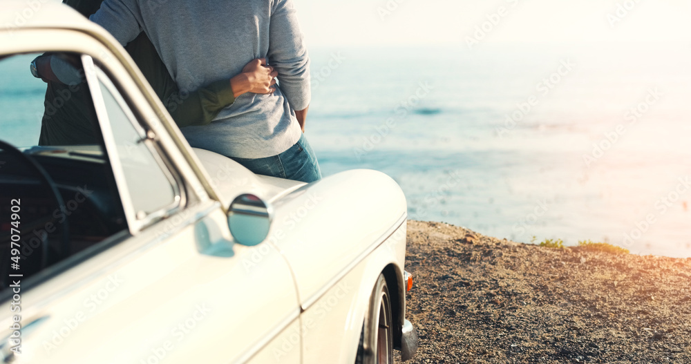 Aufkleber intimacy by the seaside. rearview shot of an unrecognizable young couple making a stop at the beach 