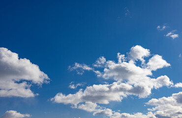 White clouds and blue sky on a spring day
