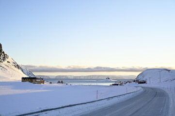 Winter road in front of ocean